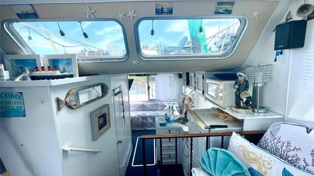 a view of living room with furniture and flat screen tv