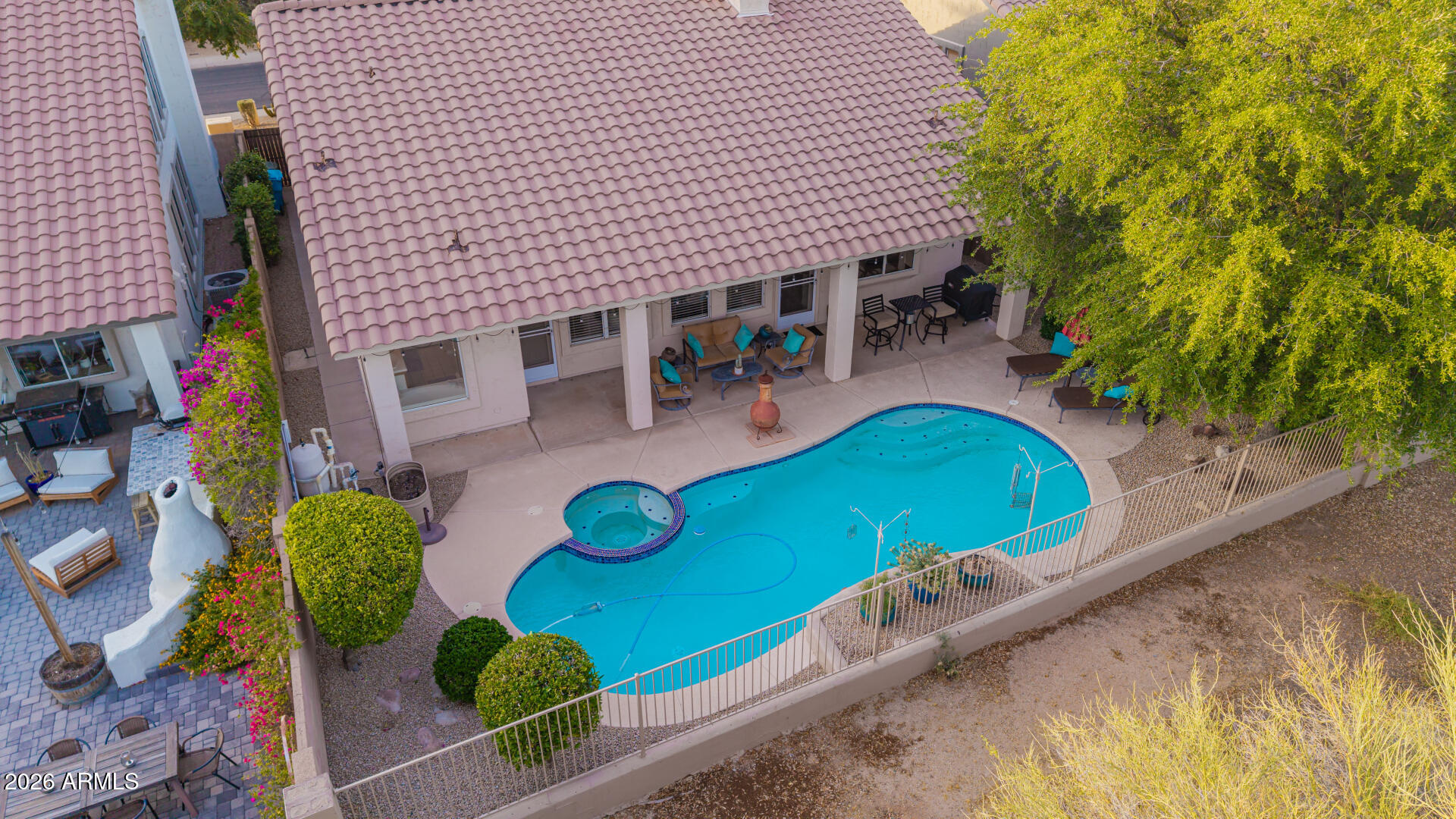 4309 East Rancho Caliente Drive Cave Creek, AZ 85331 - Photo 34 of 37 an aerial view of a house with a swimming pool