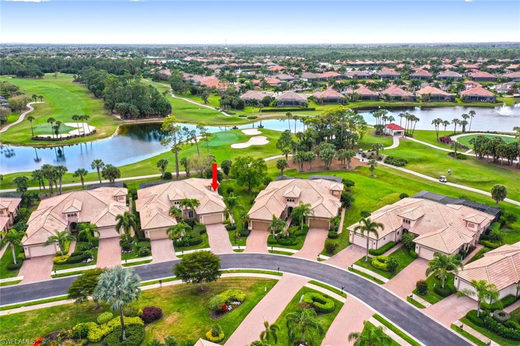 7563 Moorgate Point Way Naples, FL 34113 - Photo 4 of 50 Aerial view of Villa with unobstructed view of golf course and lake