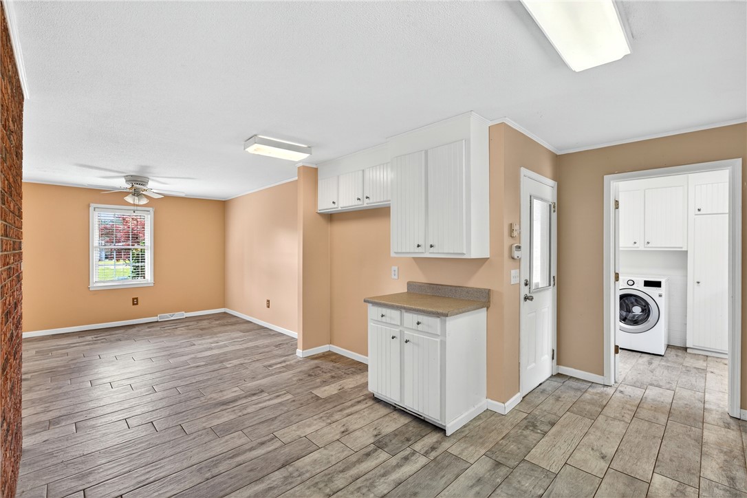 160 Burdette Circle Pendleton, SC 29670 - Photo 23 of 38 This versatile space combines a functional laundry area with convenient additional cabinetry.