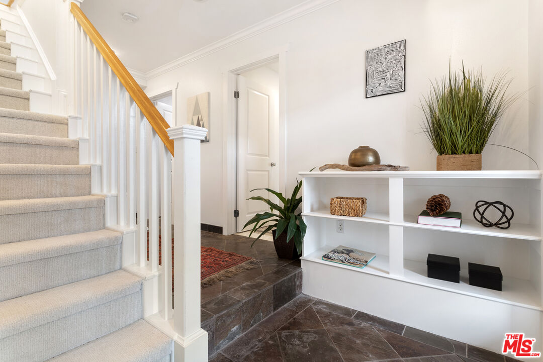 625 Diamond Street Redondo Beach, CA 90277 - Photo 22 of 42 a living room with furniture and a book shelf
