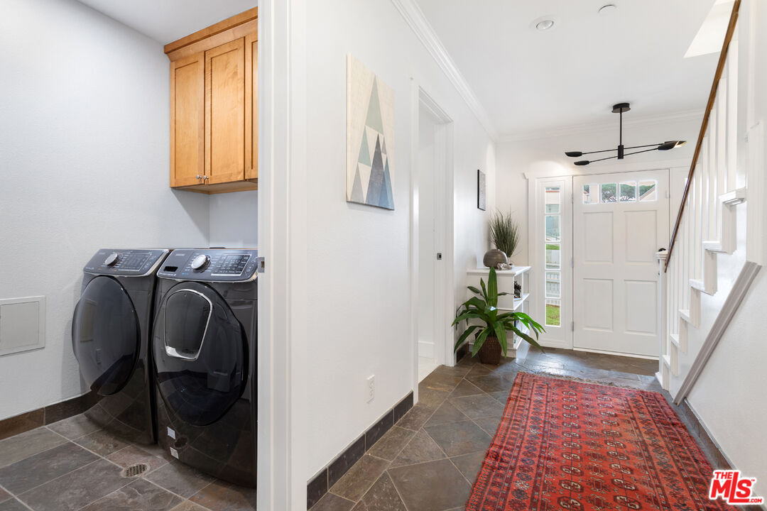 625 Diamond Street Redondo Beach, CA 90277 - Photo 23 of 42 a view of walk in closet with clothes and shoes