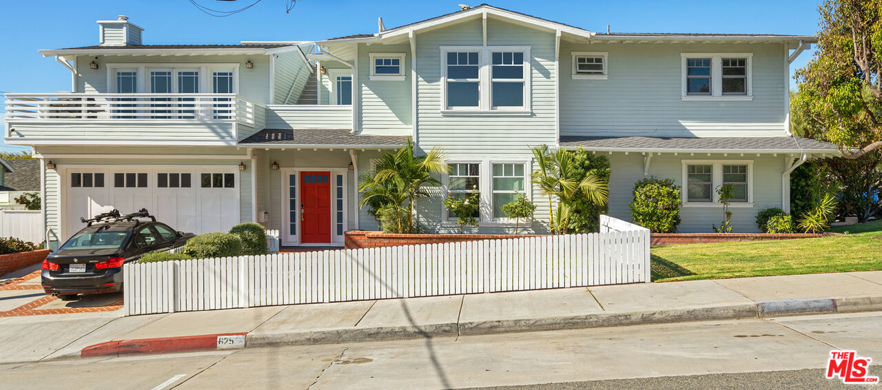 625 Diamond Street Redondo Beach, CA 90277 - Photo 3 of 42 a front view of a house with a garden