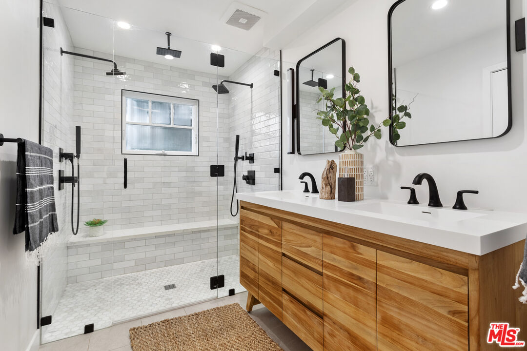 625 Diamond Street Redondo Beach, CA 90277 - Photo 33 of 42 a bathroom with a sink and a mirror