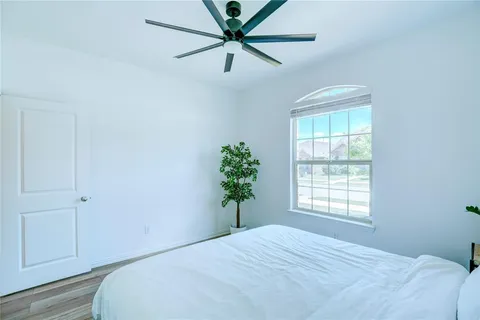 a view of a swimming pool with a lounge chairs