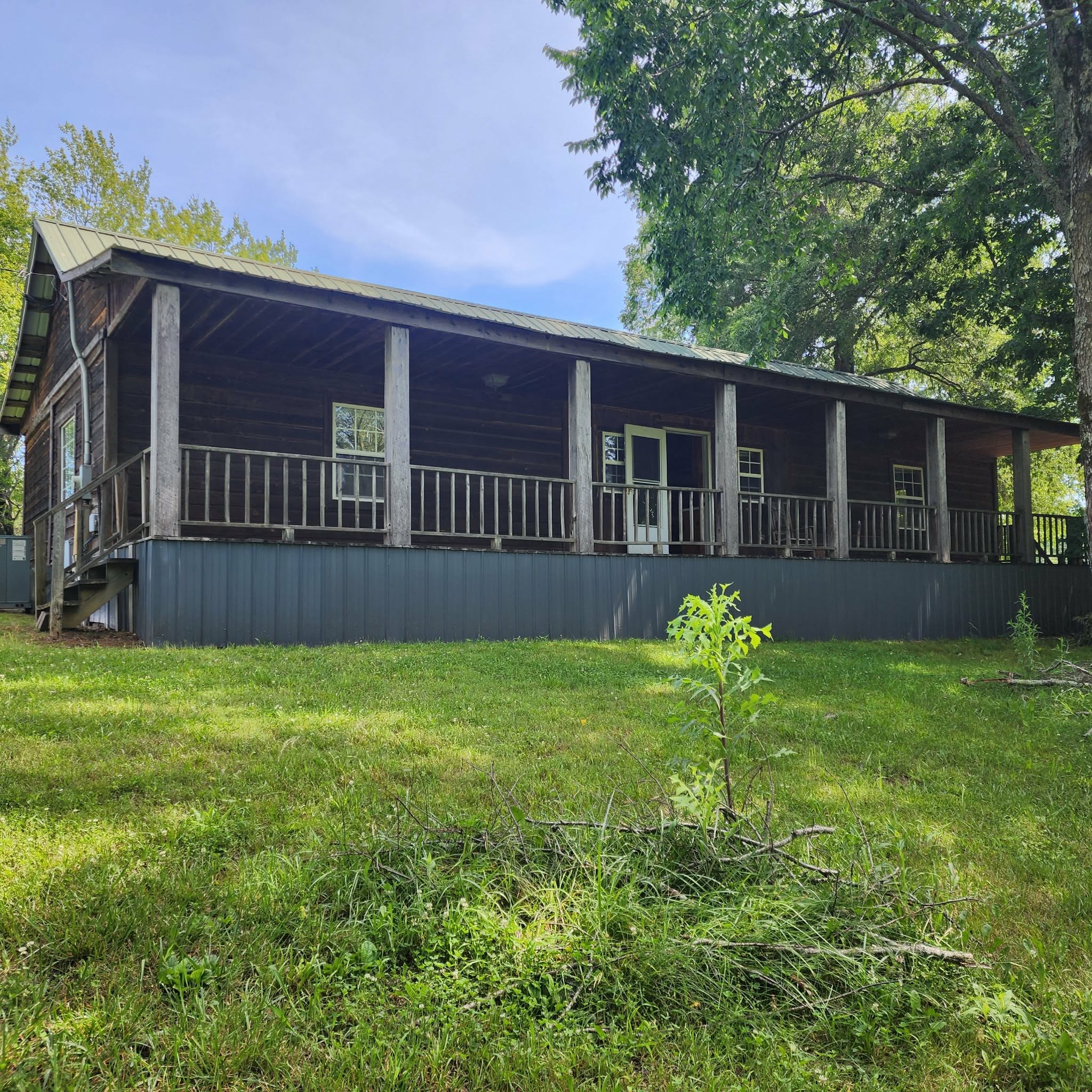 145 Mrs Gower Road Lawrenceburg, TN 38464 - Photo 3 of 26 front view of a house with a yard