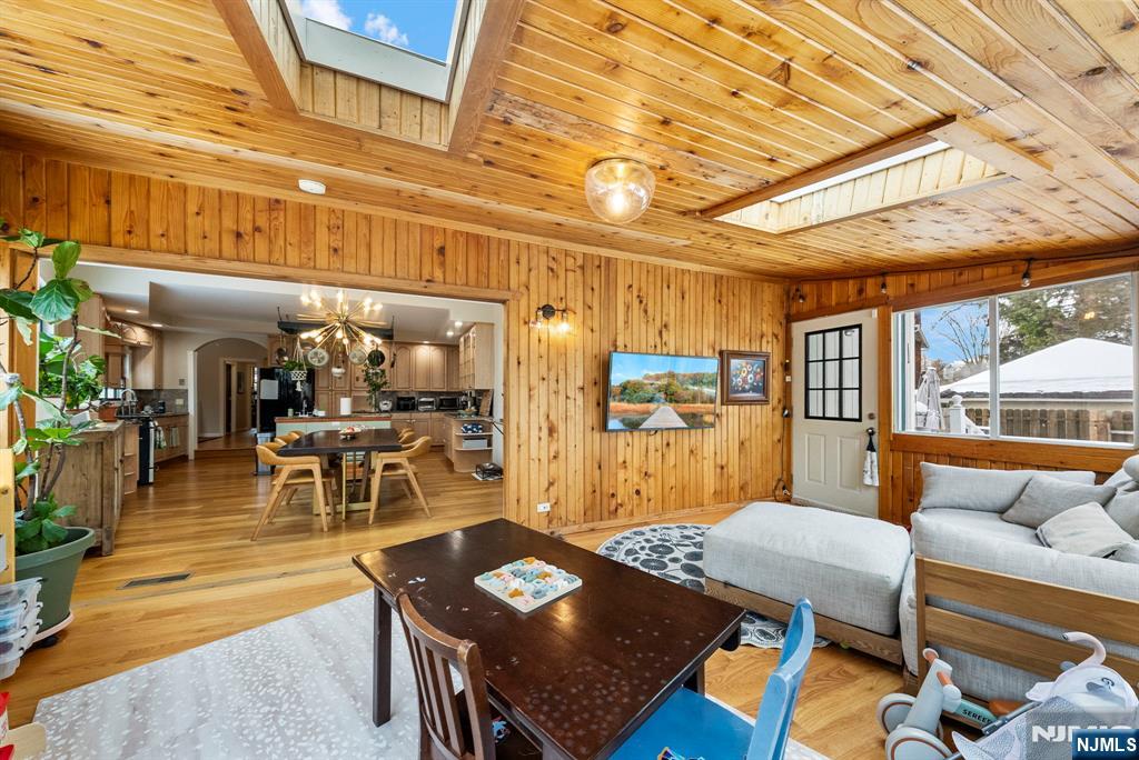 127 Hillside Avenue Cresskill, NJ 07626 - Photo 15 of 42 a living room with furniture a rug and a window