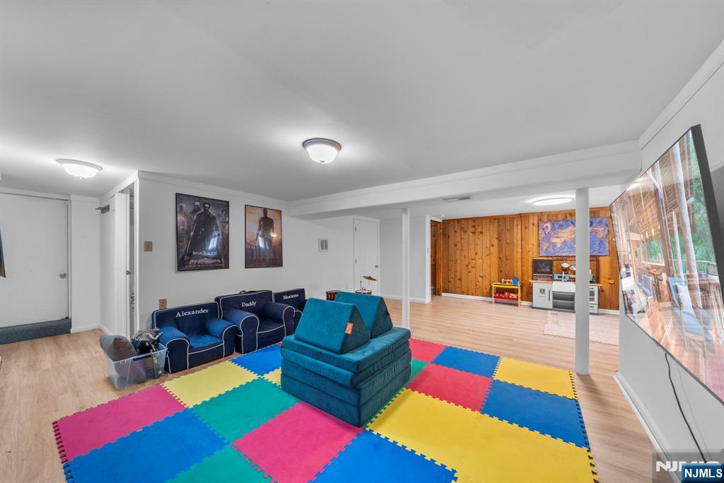 127 Hillside Avenue Cresskill, NJ 07626 - Photo 20 of 42 a living room with furniture and a rug
