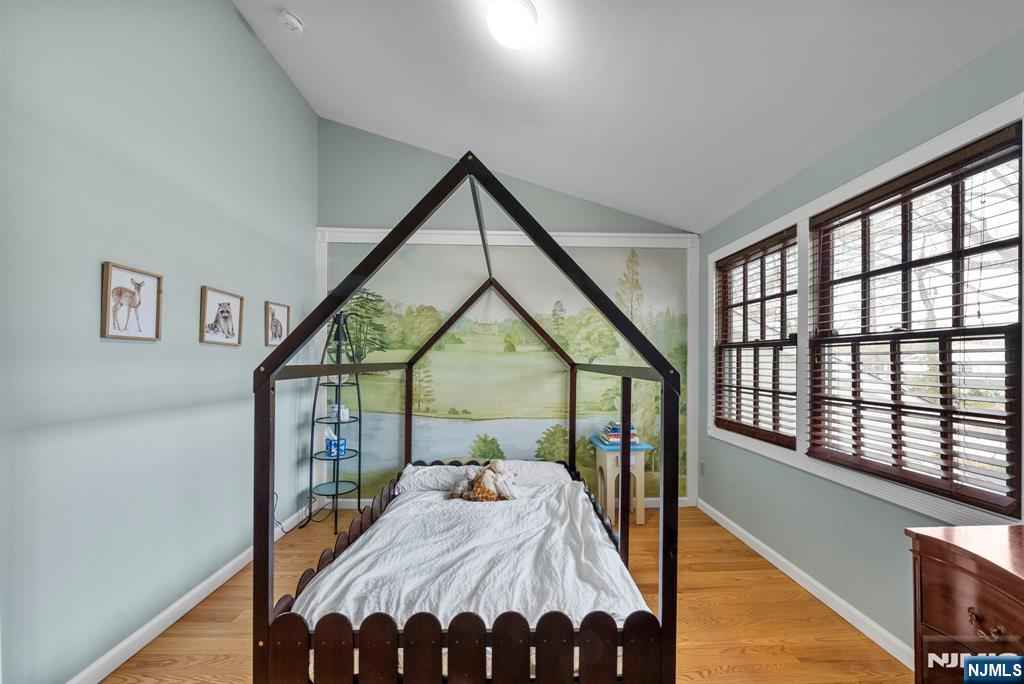 127 Hillside Avenue Cresskill, NJ 07626 - Photo 27 of 42 a bedroom with a bed and a windows