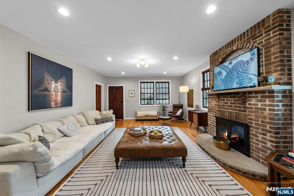 127 Hillside Avenue Cresskill, NJ 07626 - Photo 3 of 42 a living room with furniture and a fireplace