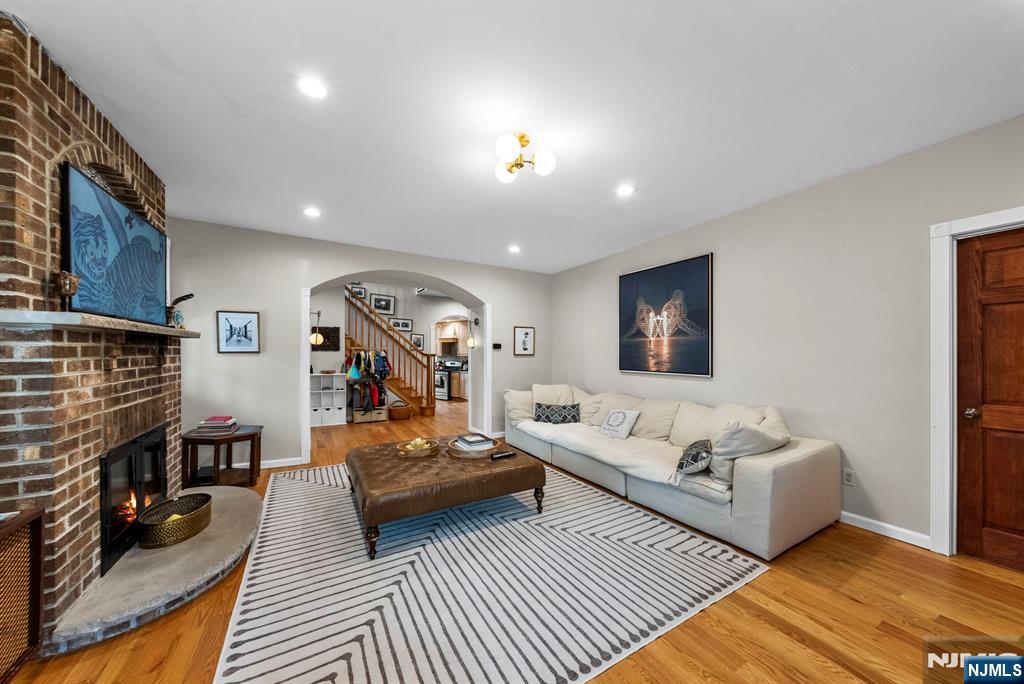 127 Hillside Avenue Cresskill, NJ 07626 - Photo 4 of 42 a living room with furniture and a flat screen tv