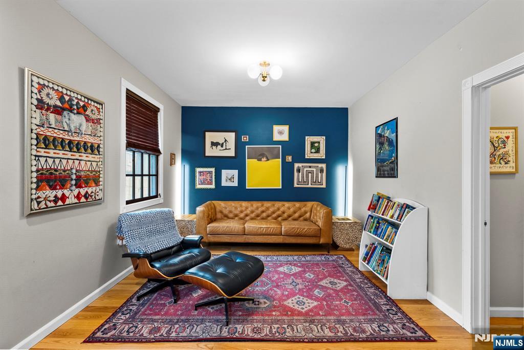 127 Hillside Avenue Cresskill, NJ 07626 - Photo 6 of 42 a living room with furniture and a rug