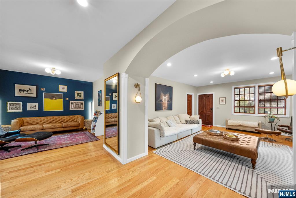 127 Hillside Avenue Cresskill, NJ 07626 - Photo 8 of 42 a living room with furniture and a couch