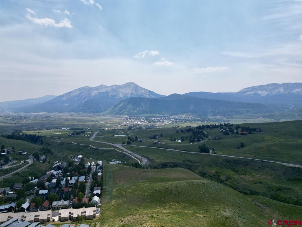 19 Buttercup Lane Crested Butte, CO 81225 - Photo 5 of 17 a view of a lush green hillside and houses