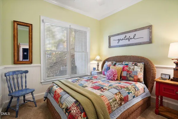 an aerial view of a house with a ocean view