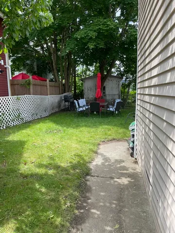 a view of a backyard with a garden