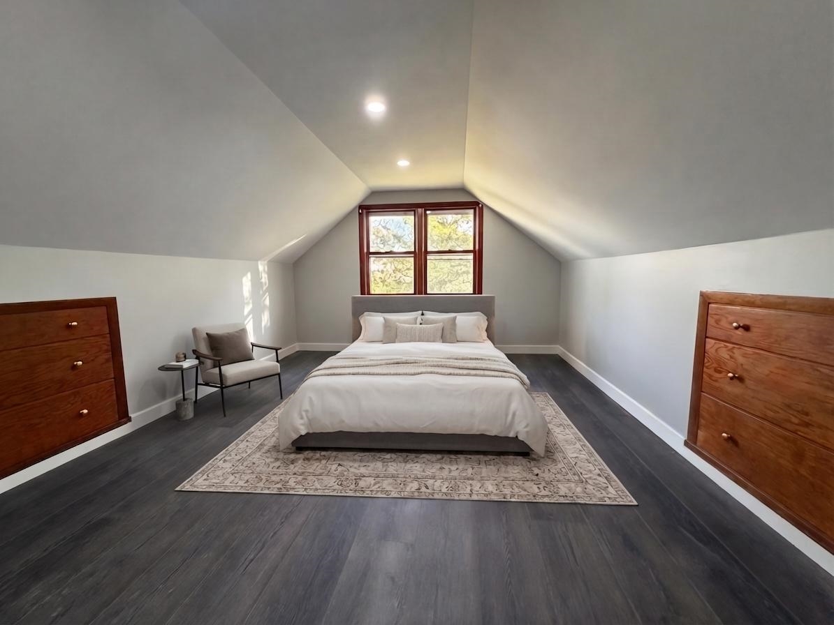 8415 Ravere Street Machesney Park, IL 61115 - Photo 15 of 19 a spacious bedroom with a bed and a dresser