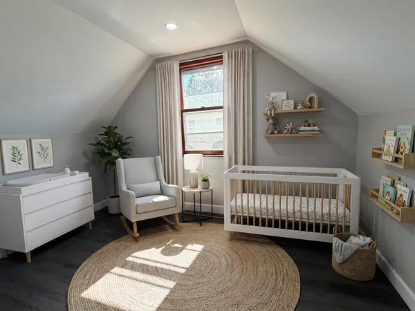 a bedroom with a bed and a couch