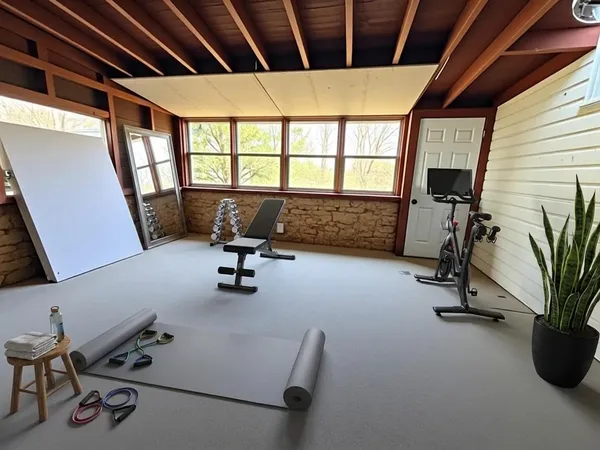 a view of a room with gym equipment