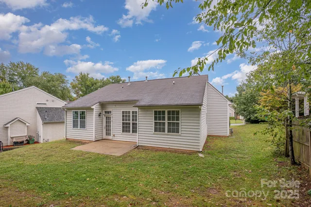 a house view with a garden space