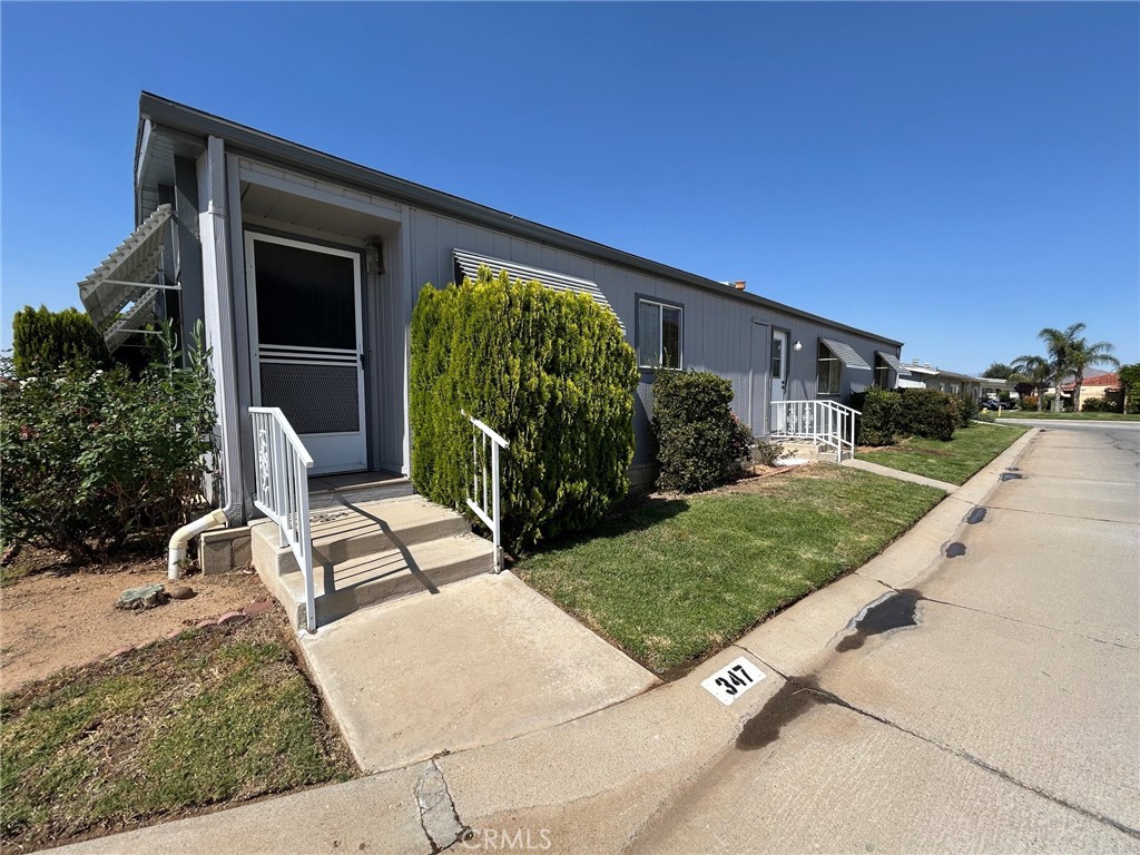 27250 Murrieta Road, Unit 347 Menifee, CA 92586 - Photo 39 of 39 front view of house with a yard