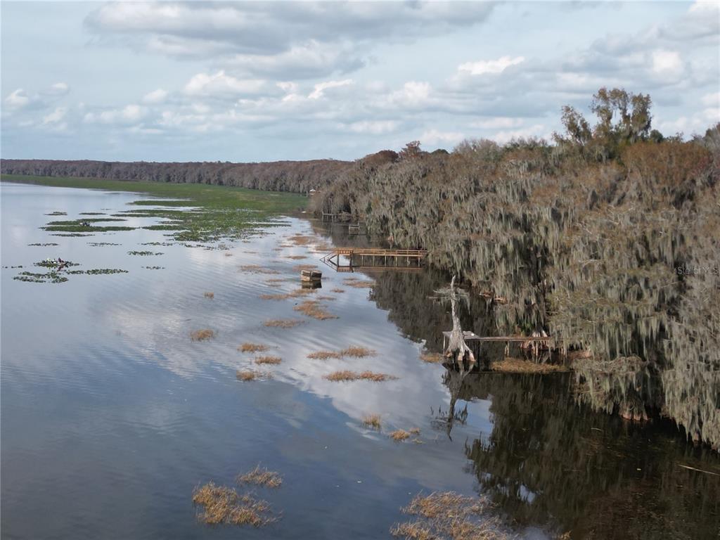 202nd Terrace Hawthorne, FL 32640 - Photo 2 of 10 a view of a lake with top of a house