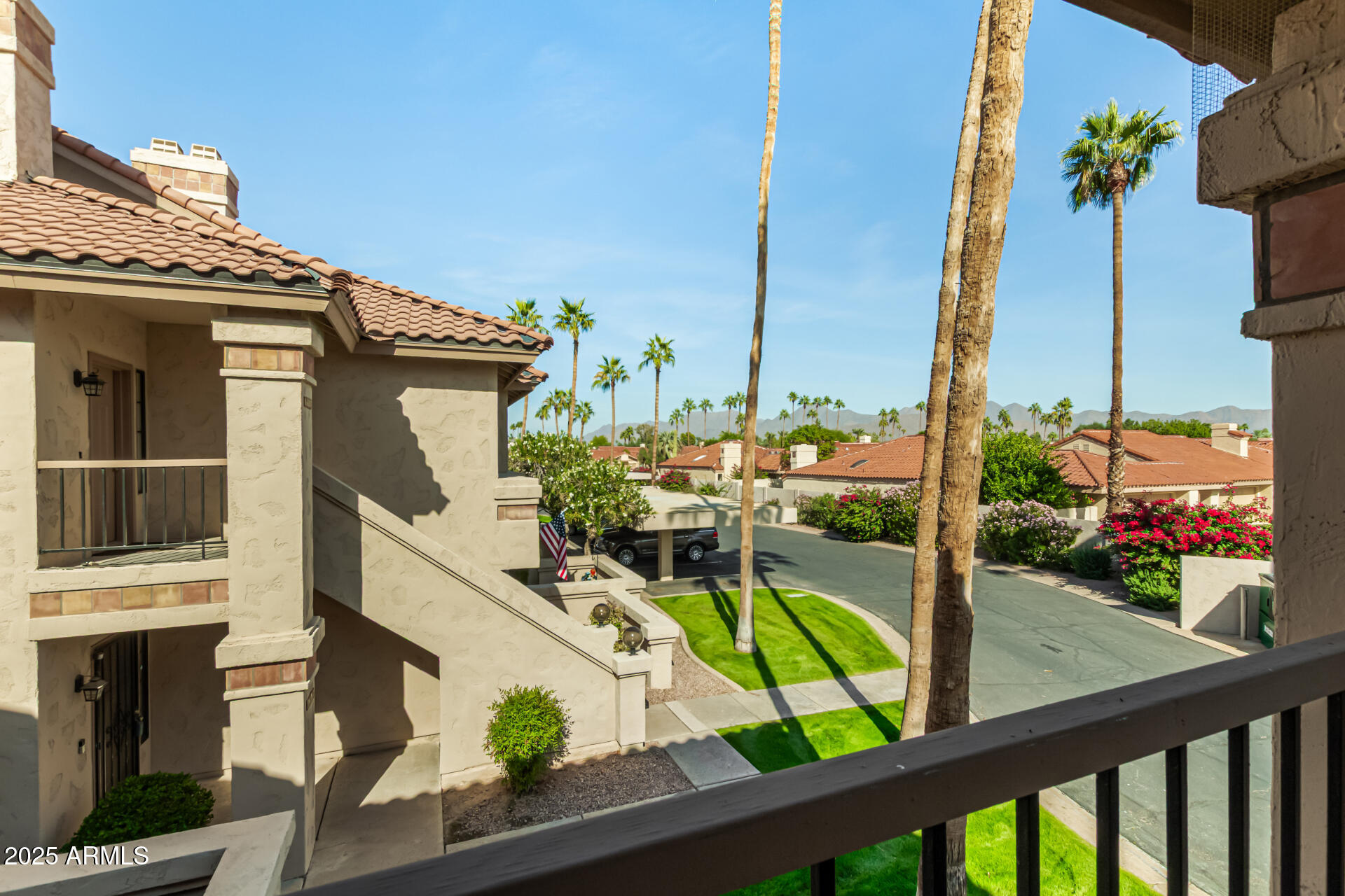 9711 East Mountain View Road, Unit 2514 Scottsdale, AZ 85258 - Photo 19 of 26 a view of a balcony with yard
