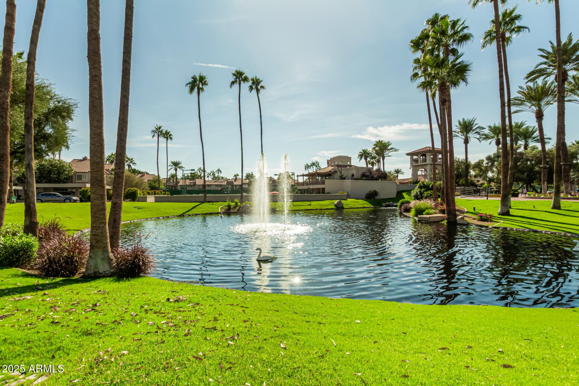 9711 East Mountain View Road, Unit 2514 Scottsdale, AZ 85258 - Photo 25 of 26 a view of a lake with boats