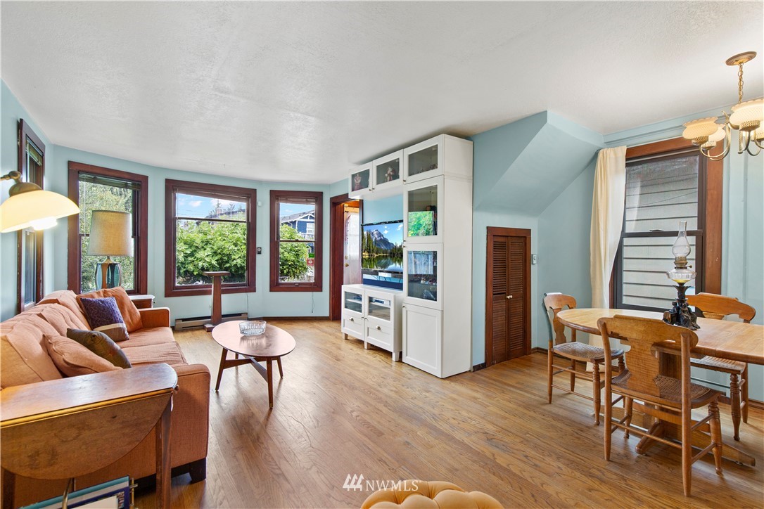 907 North 68th Street Seattle, WA 98103 - Photo 3 of 36 a living room with furniture and a large window