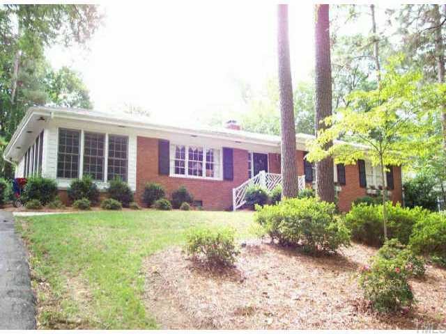 3304 Milton Road Raleigh, NC 27609 - Photo 1 of 1 a front view of a house with garden