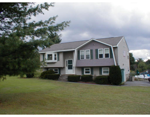 154 Allen Road Billerica, MA 01821 - Photo 1 of 1 a front view of a house with a yard