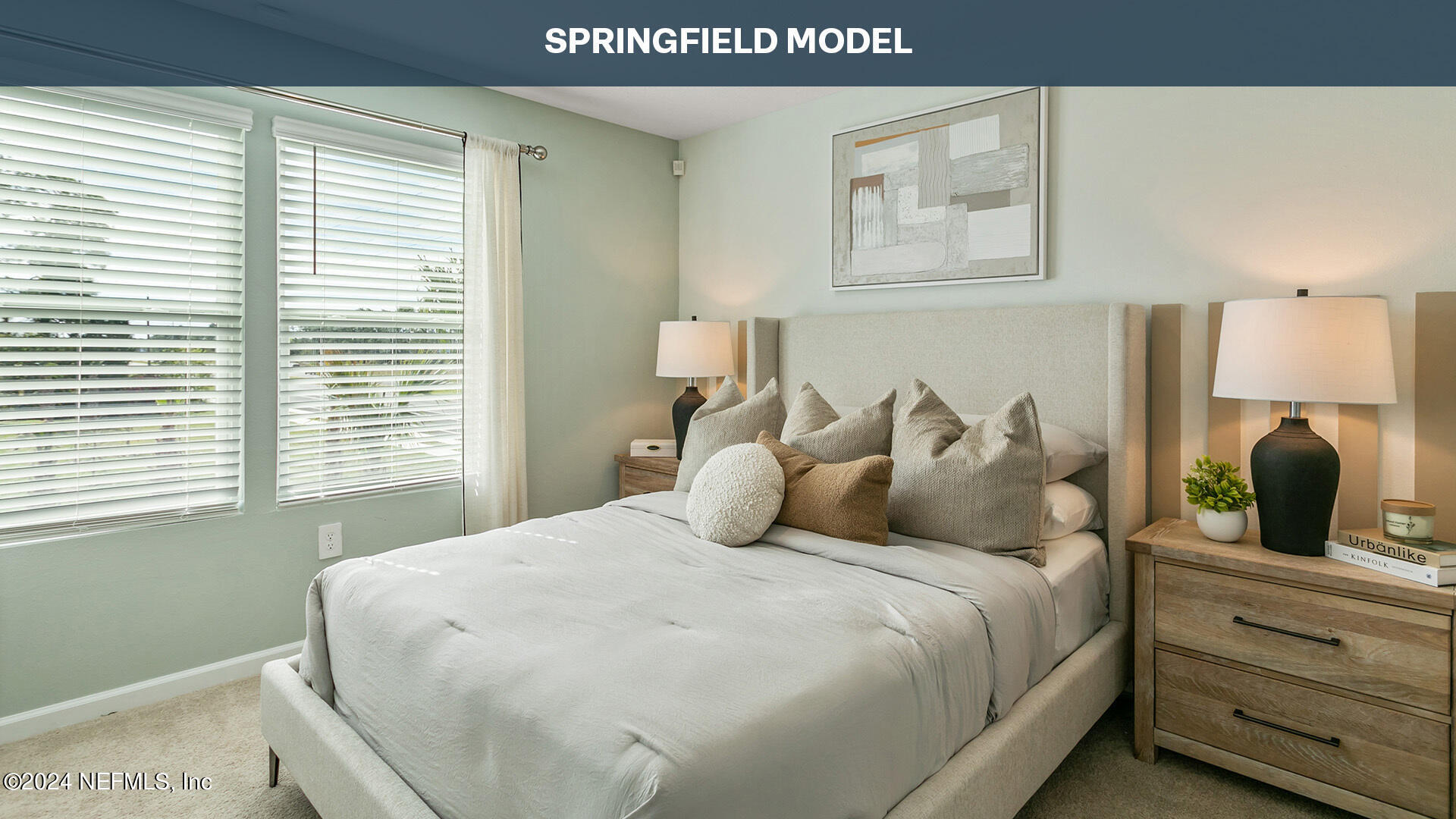 59 Wading Ibis Road St. Augustine, FL 32095 - Photo 13 of 38 a bedroom with a large bed and a window