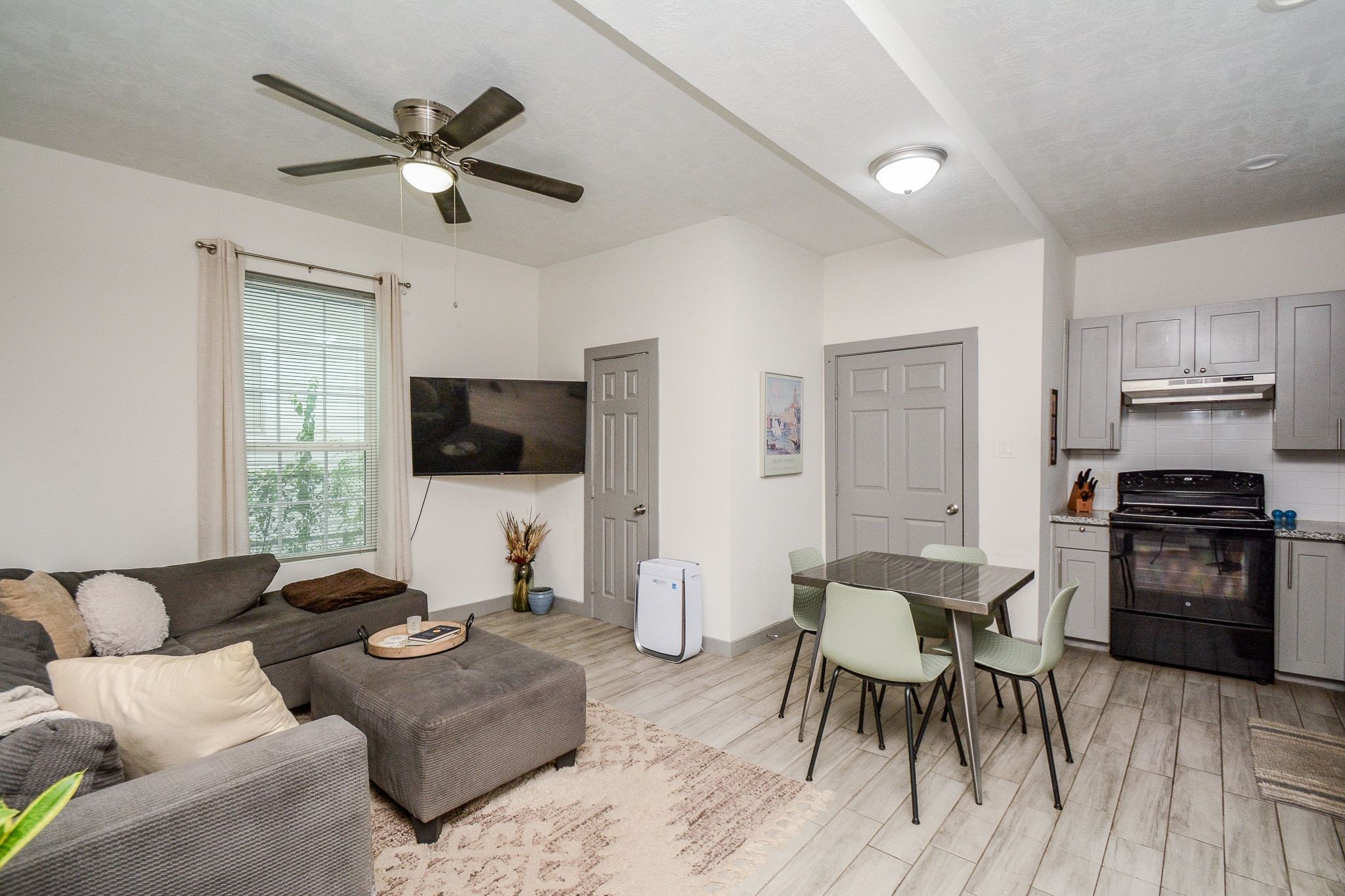 2018 Fulton Street, Unit 2 Houston, TX 77009 - Photo 6 of 20 Living room has great natural light and unit has central HVAC.