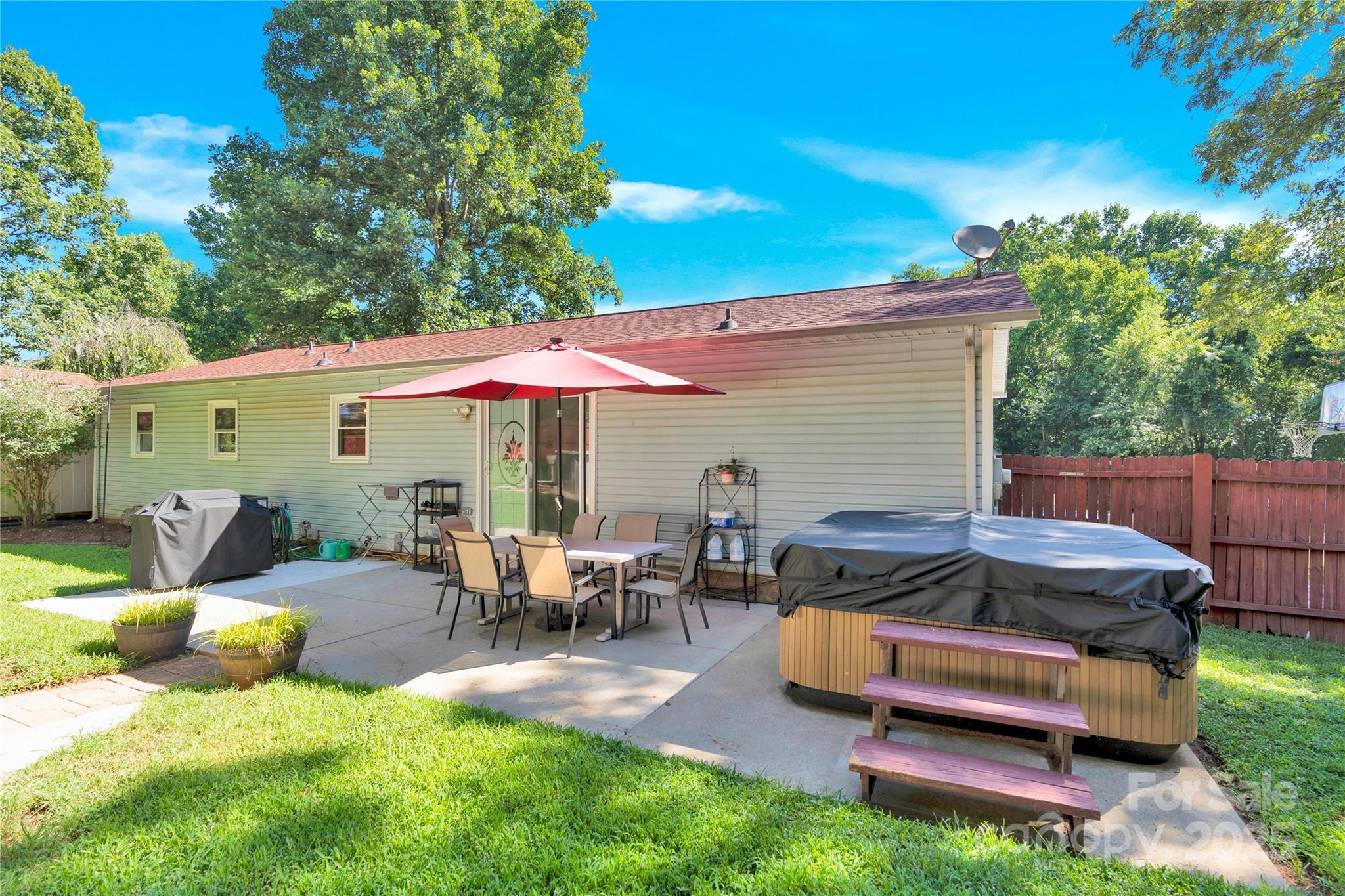 159 Bowman Road Statesville, NC 28625 - Photo 11 of 38 a view of a backyard with a patio