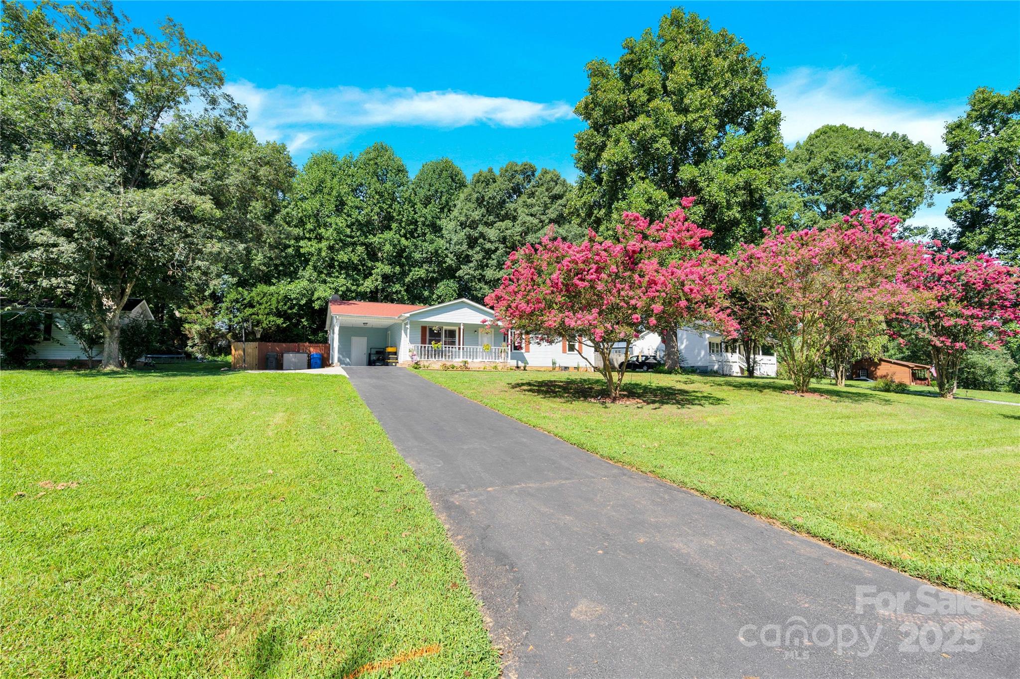 159 Bowman Road Statesville, NC 28625 - Photo 27 of 38 a view of a house with a yard