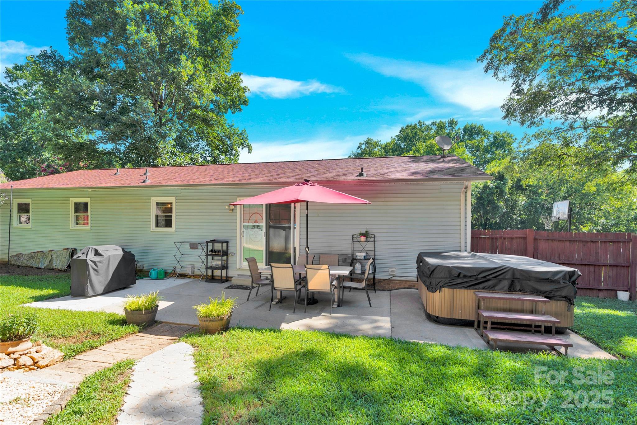 159 Bowman Road Statesville, NC 28625 - Photo 30 of 38 a backyard of a house with seating space
