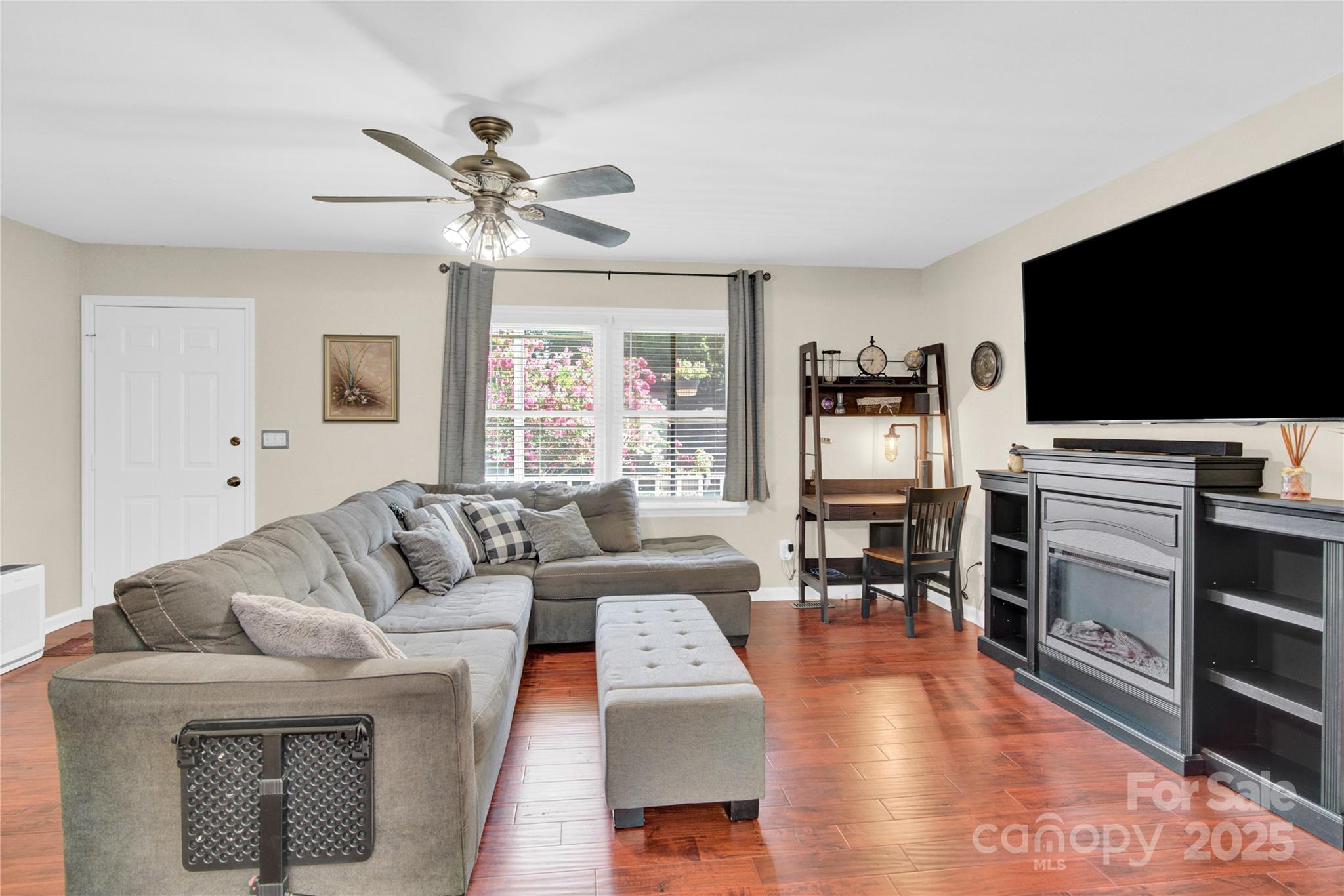 159 Bowman Road Statesville, NC 28625 - Photo 3 of 38 a living room with furniture and a flat screen tv