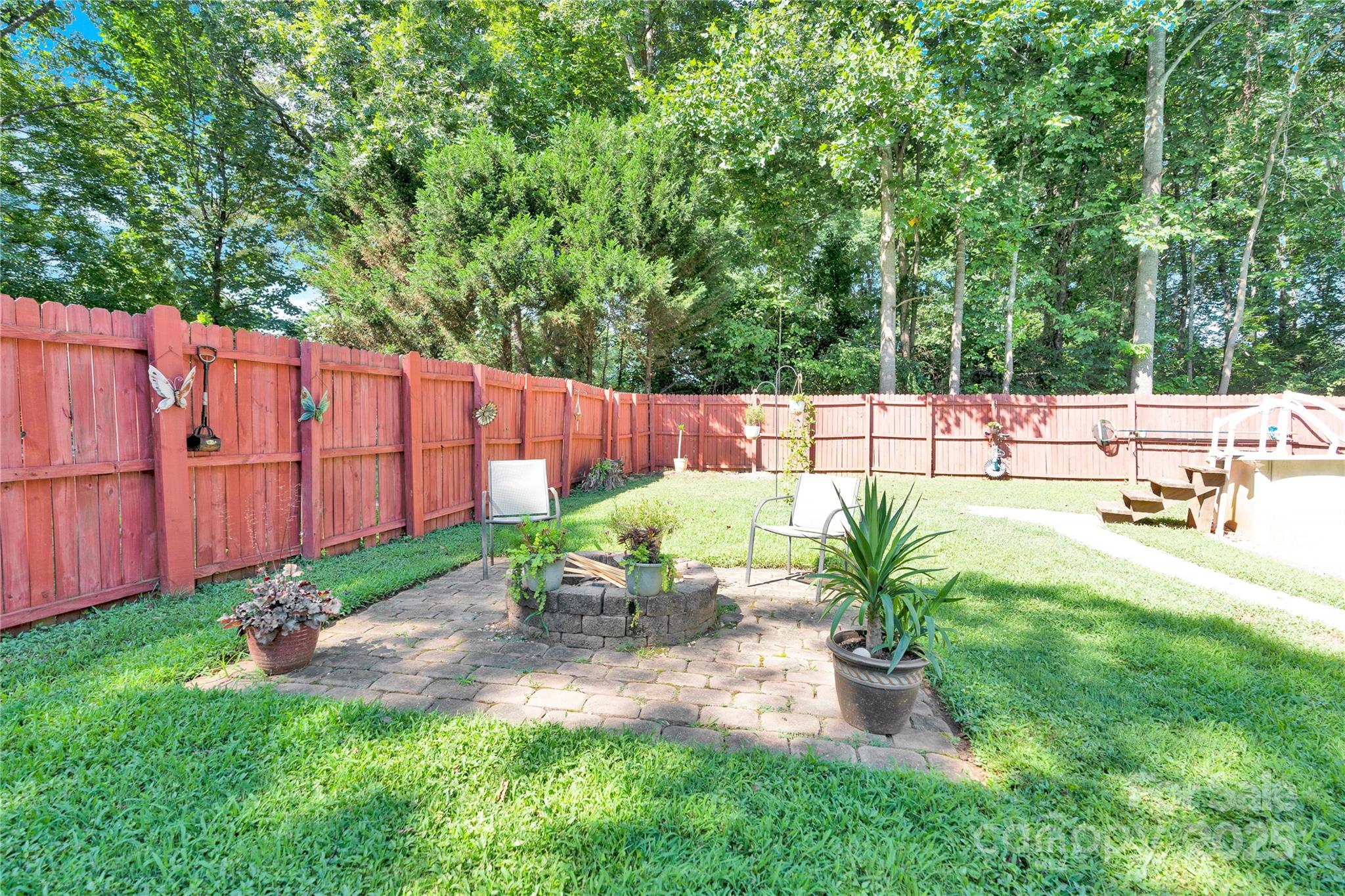 159 Bowman Road Statesville, NC 28625 - Photo 31 of 38 a view of a backyard with sitting area