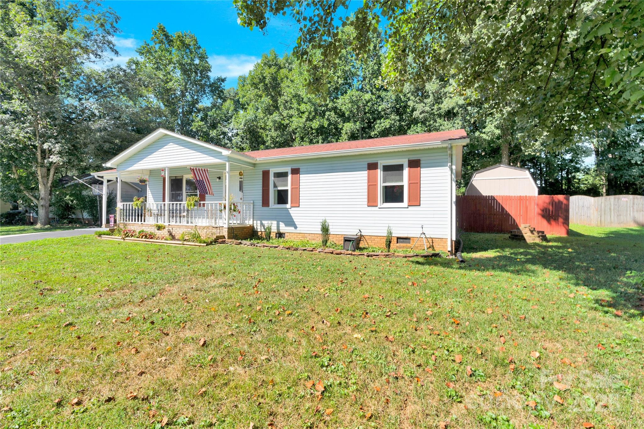 159 Bowman Road Statesville, NC 28625 - Photo 33 of 38 a front view of house with yard and green space
