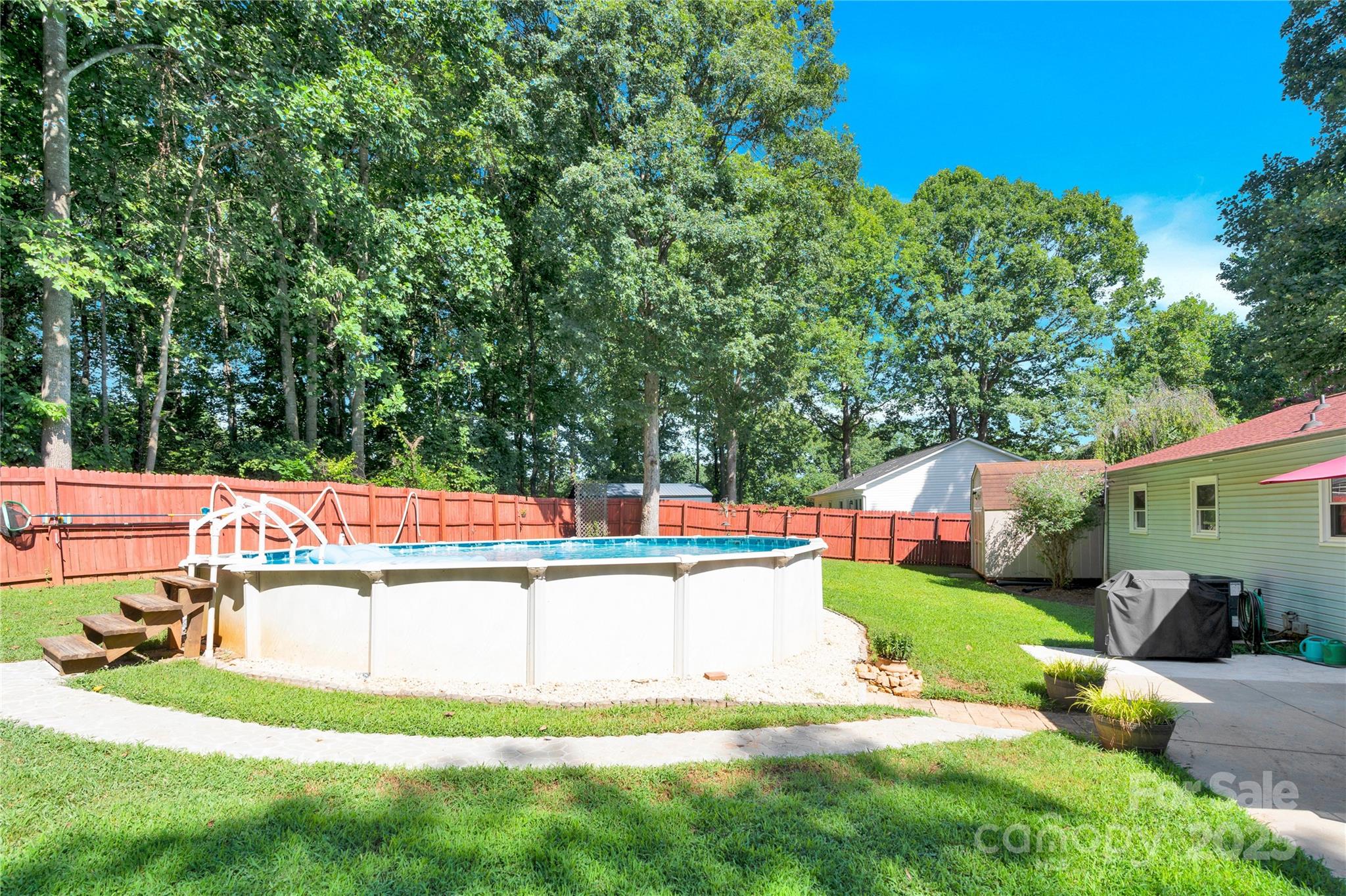 159 Bowman Road Statesville, NC 28625 - Photo 34 of 38 a view of a swimming pool with a patio