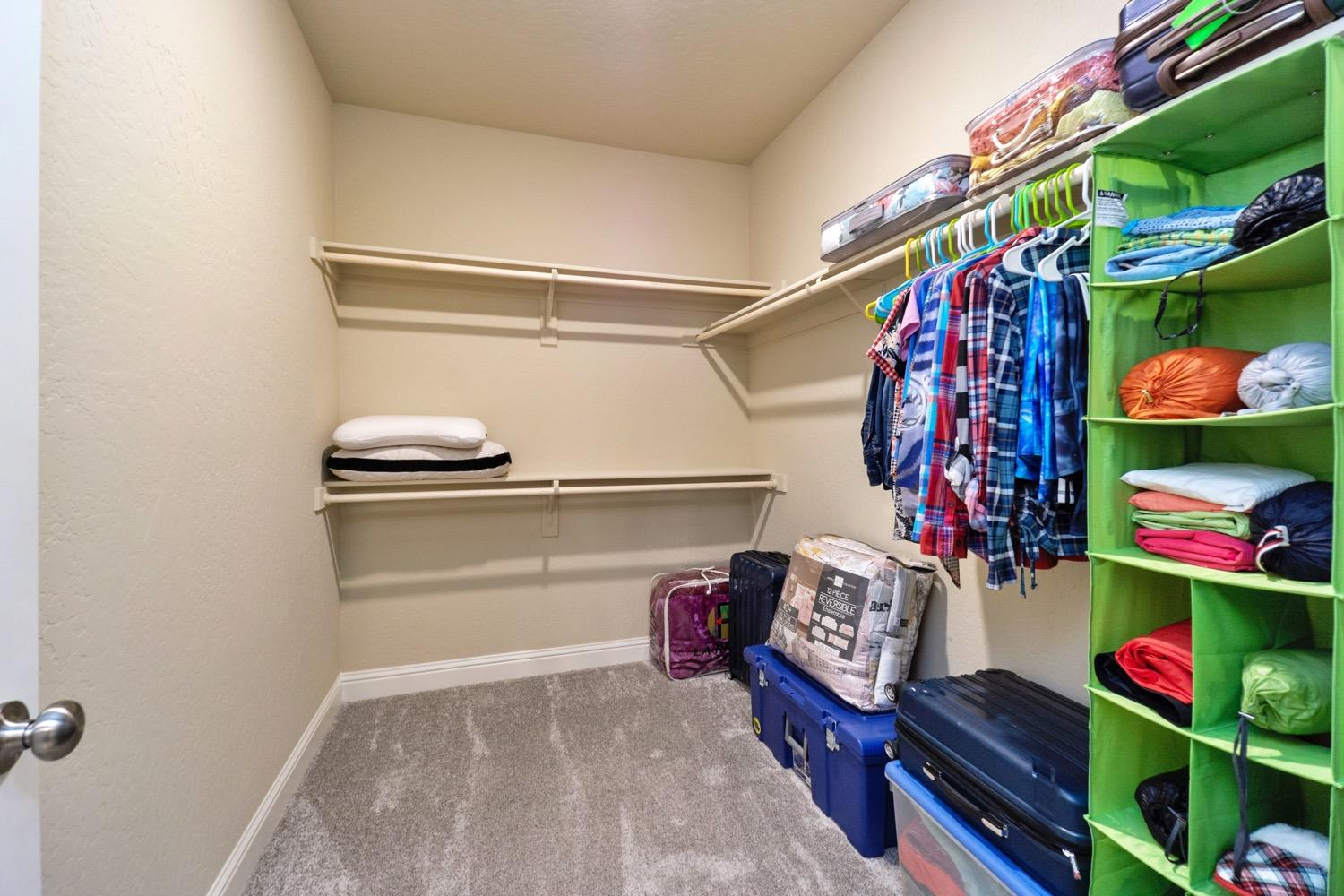 881 Strada Street Lemoore, CA 93245 - Photo 18 of 39 Primary Suite walk-in closet