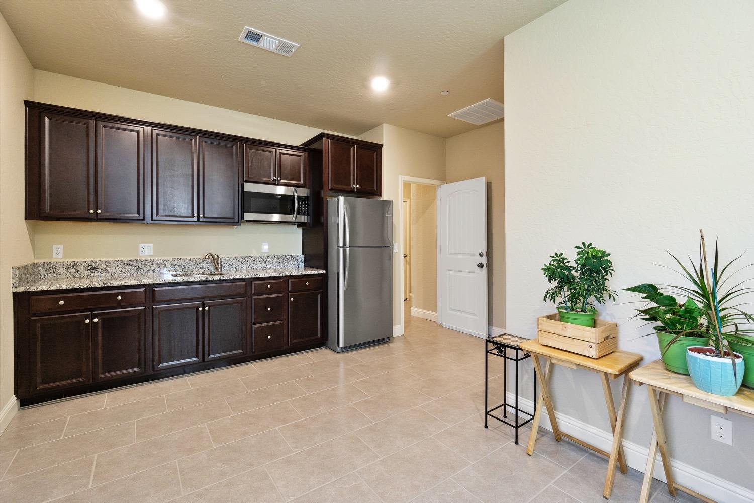 881 Strada Street Lemoore, CA 93245 - Photo 22 of 39 NextGen Kitchen/Dining