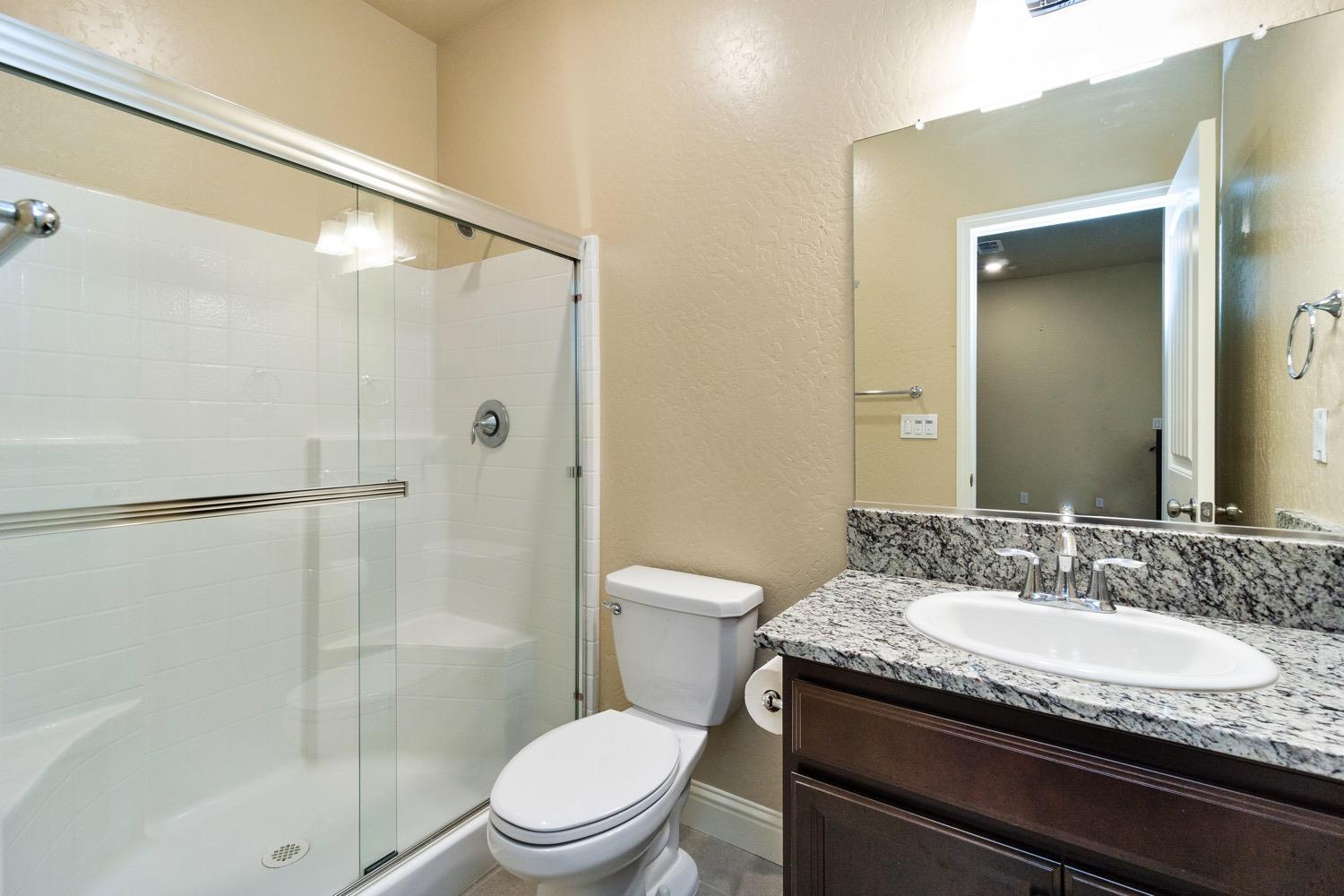 881 Strada Street Lemoore, CA 93245 - Photo 25 of 39 NextGen bathroom