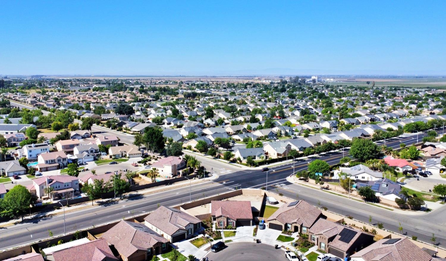 881 Strada Street Lemoore, CA 93245 - Photo 38 of 39 Home is centered at bottom, at the curve in the road