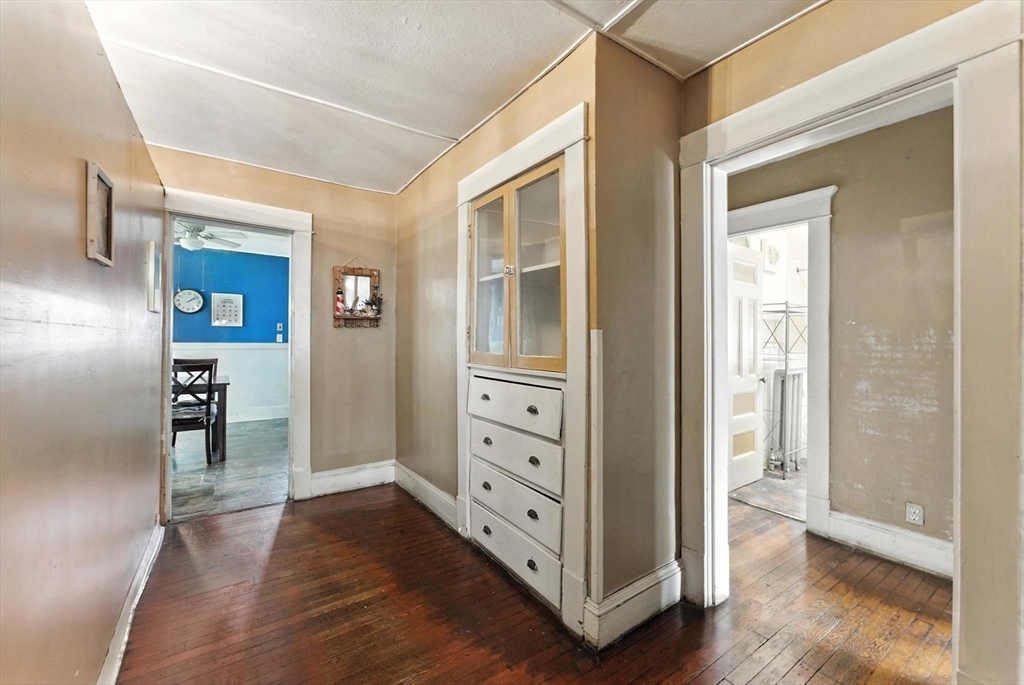 18-20 Eldridge Street Springfield, MA 01108 - Photo 11 of 42 a view of livingroom with hallway