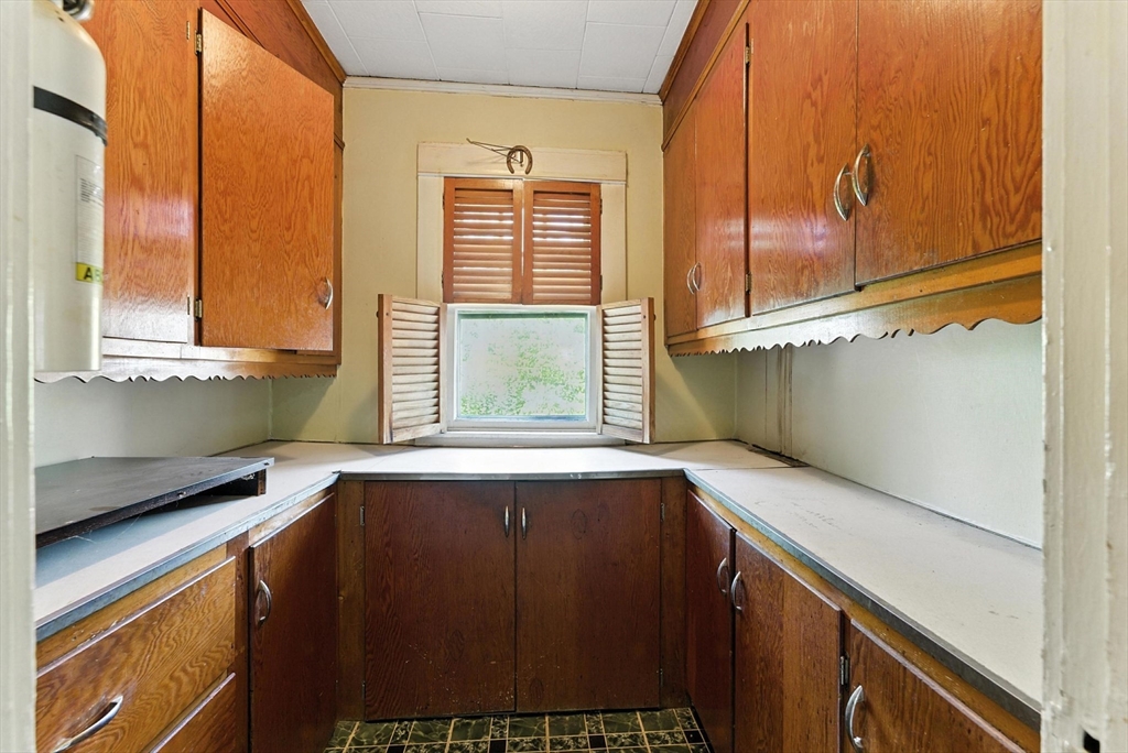 18-20 Eldridge Street Springfield, MA 01108 - Photo 21 of 42 a view of a kitchen with a sink and cabinets