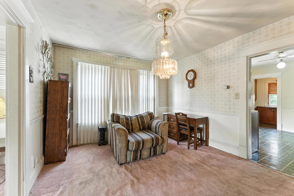 18-20 Eldridge Street Springfield, MA 01108 - Photo 26 of 42 a living room with furniture and wooden floor