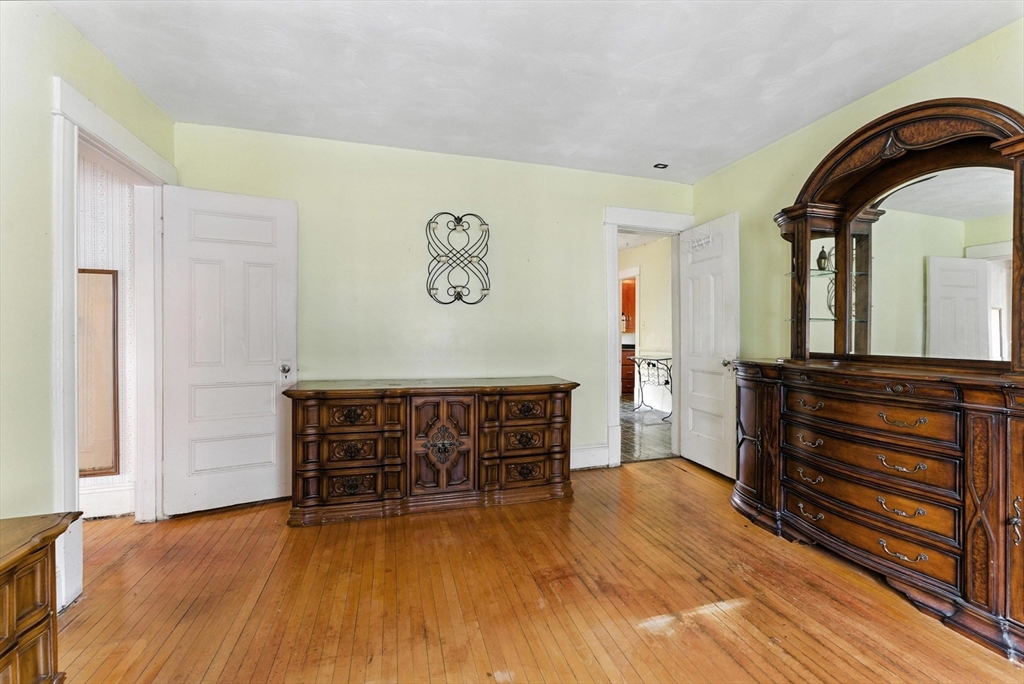 18-20 Eldridge Street Springfield, MA 01108 - Photo 34 of 42 a view of room with painting and a ceiling fan