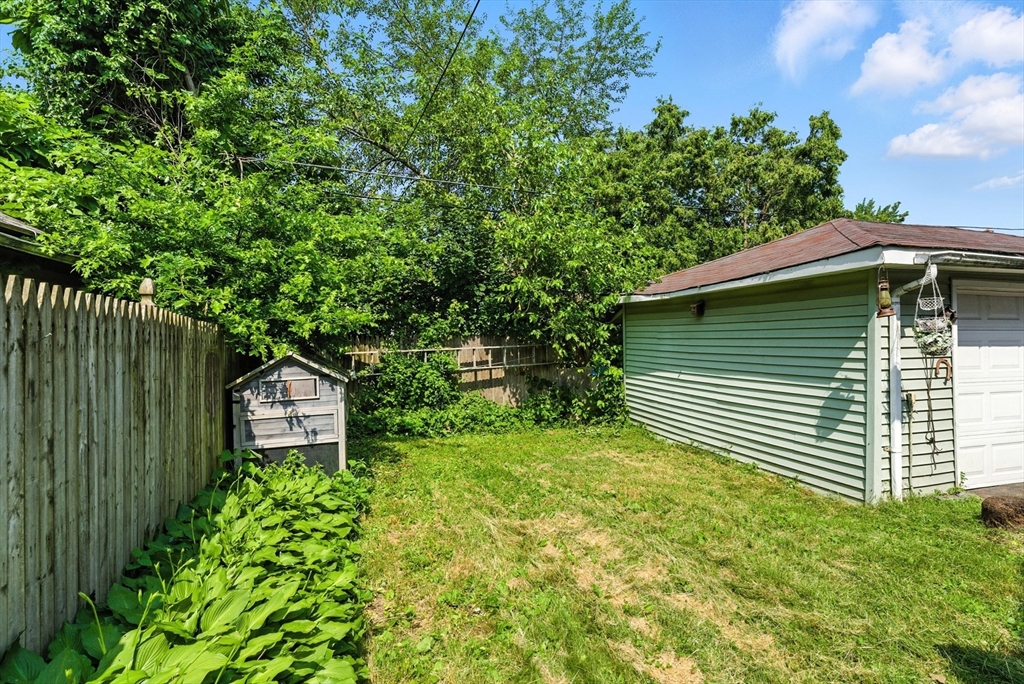 18-20 Eldridge Street Springfield, MA 01108 - Photo 40 of 42 a green field with trees in the background