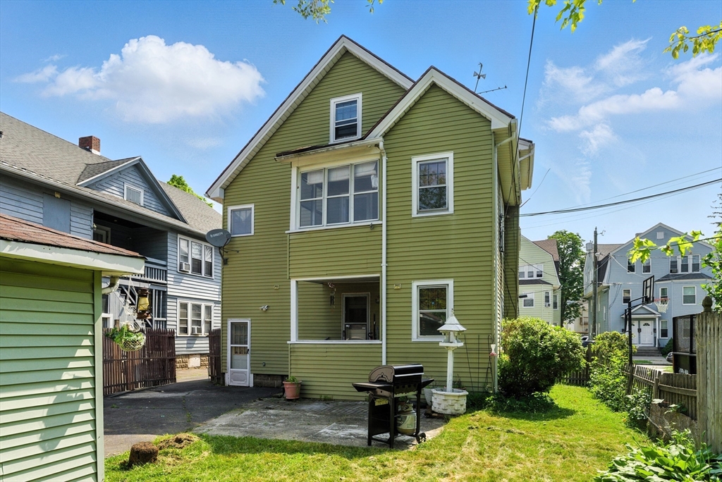 18-20 Eldridge Street Springfield, MA 01108 - Photo 41 of 42 a front view of a house with garden